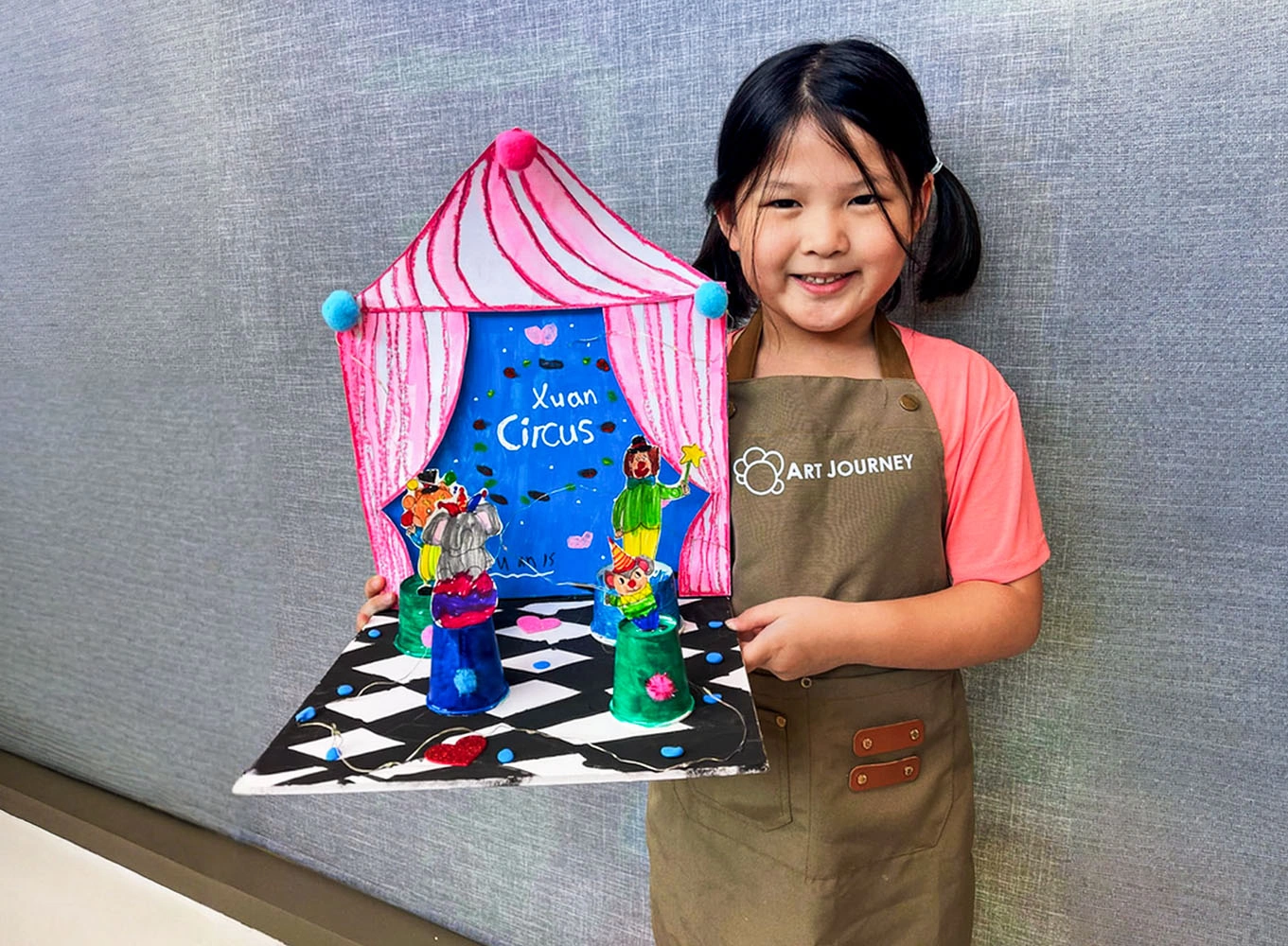 Children participating in colorful themed art activities at Art Journey