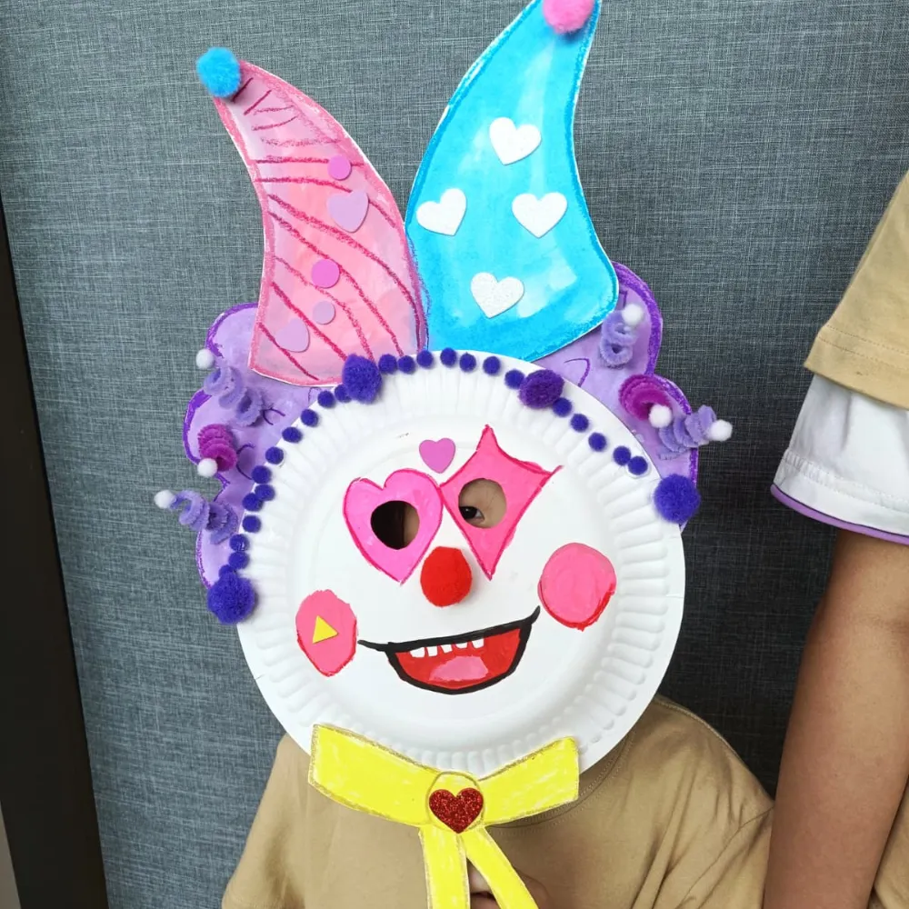 Children enjoying Circus Carnival themed art painting and crafts