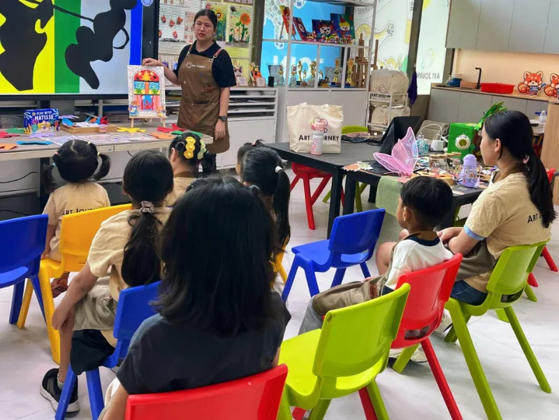 Kids participating in art exhibition event in Singapore