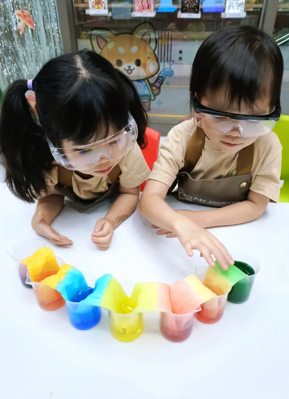 Kids painting themed artworks during creative art session