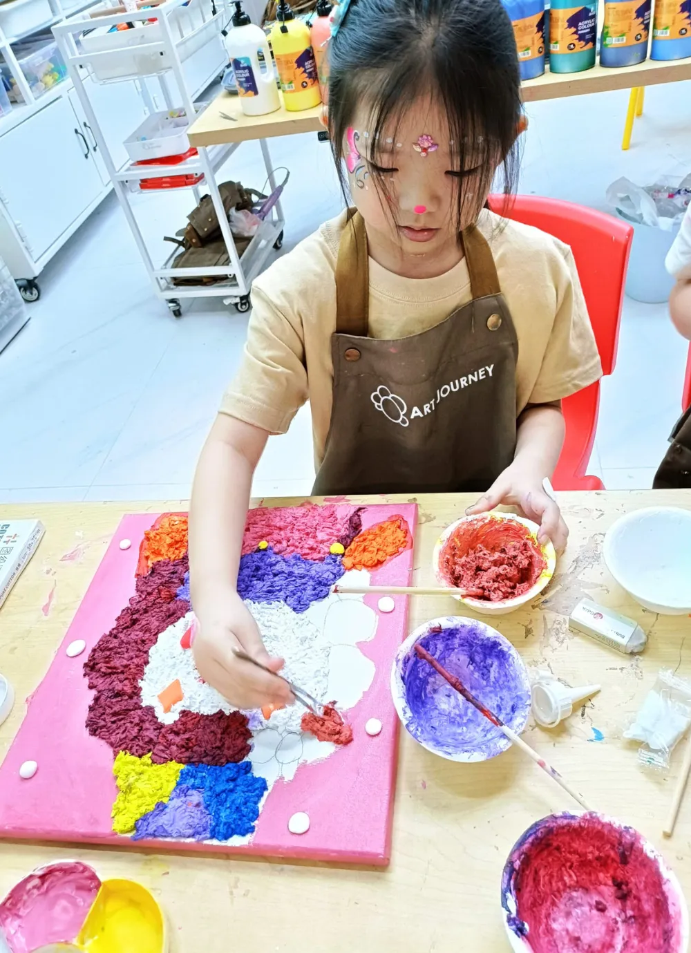 Ladybug themed art activity designed for children in Singapore