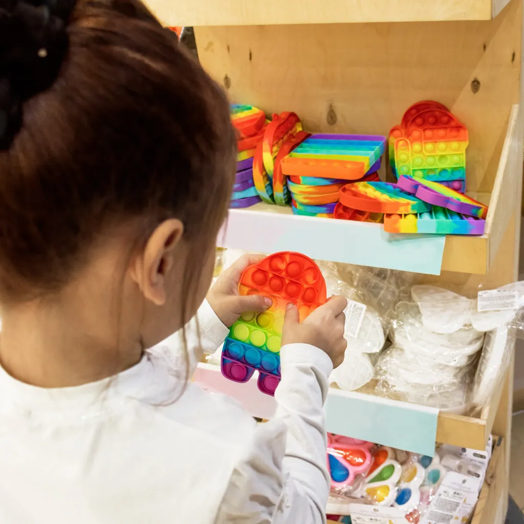 Students painting during a fun school art workshop in Singapore