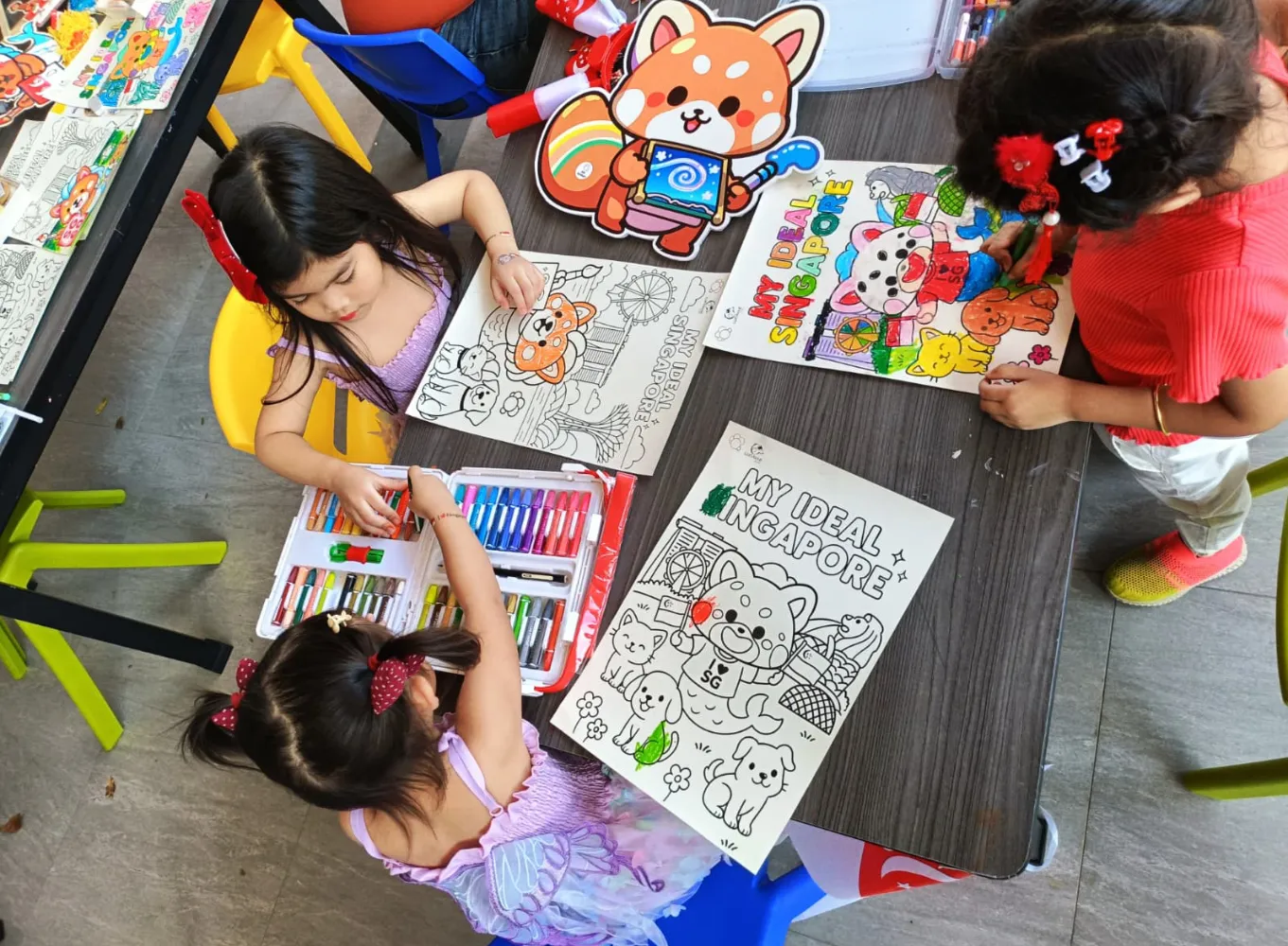Young artists participating in painting competition in Singapore