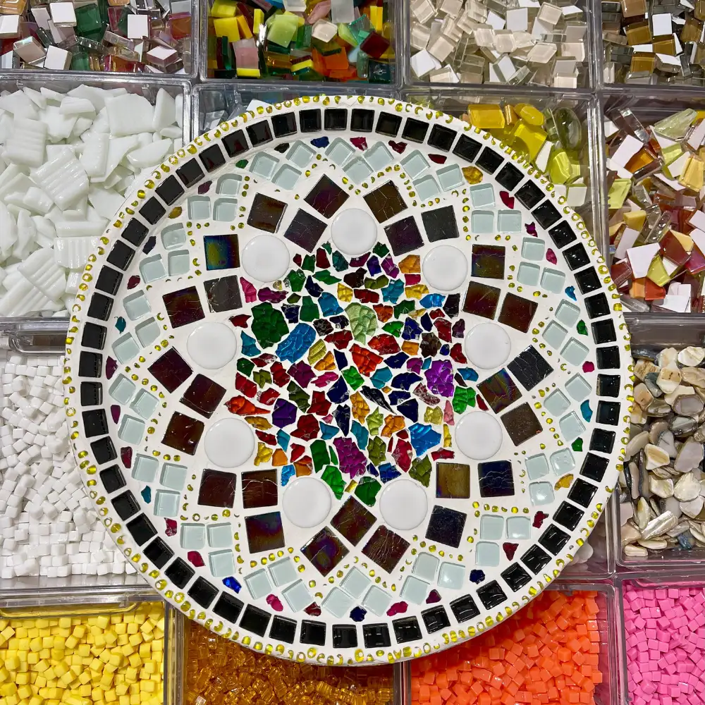 Colorful round mosaic plate for wall or table decoration.