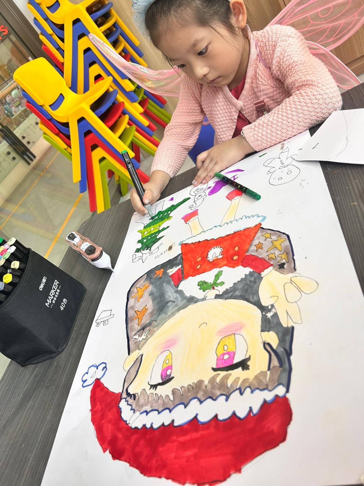 Girl with fairy wings drawing at Art Journey