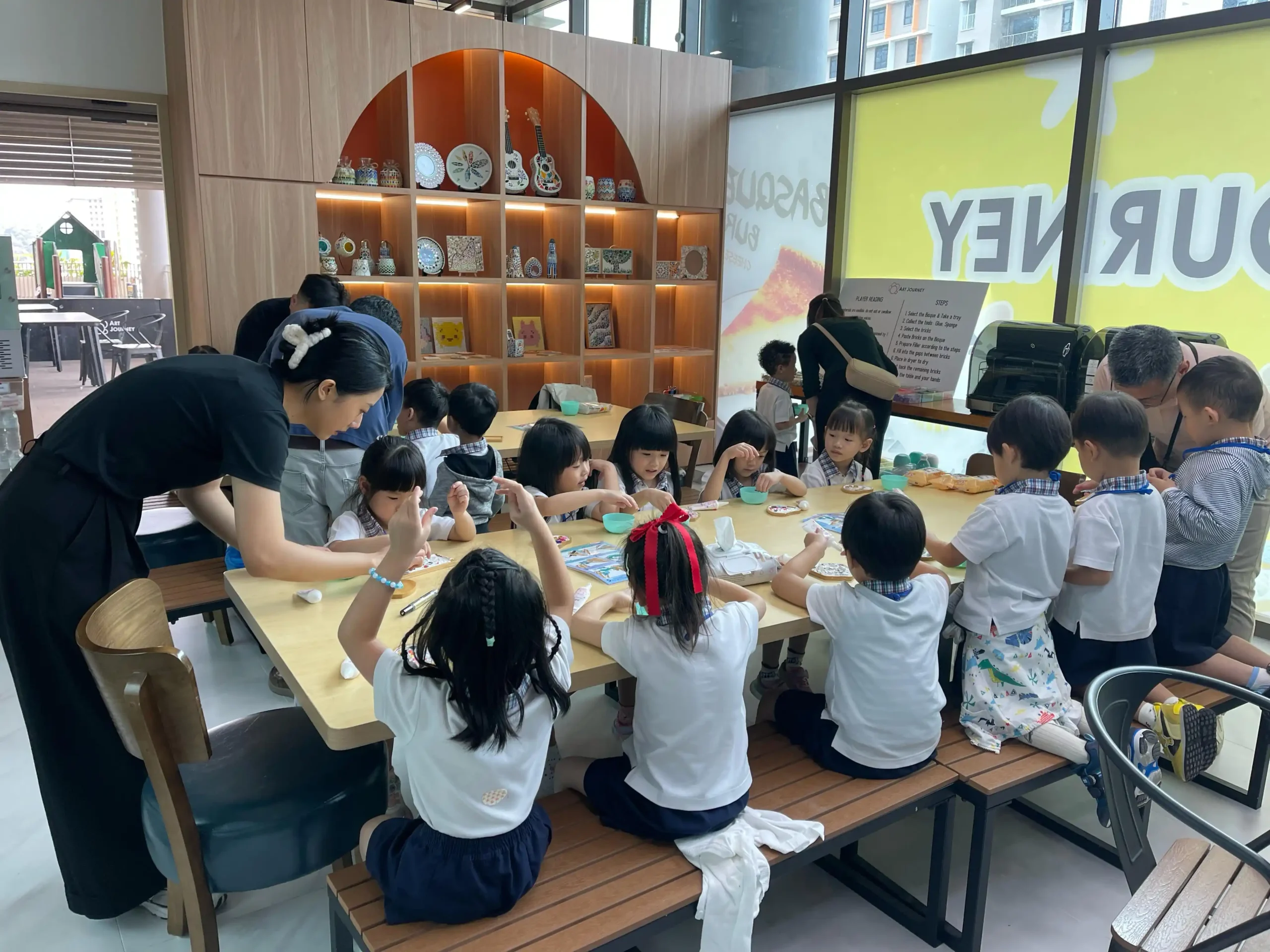 Children enjoying creative activities during the June school holidays in Singapore