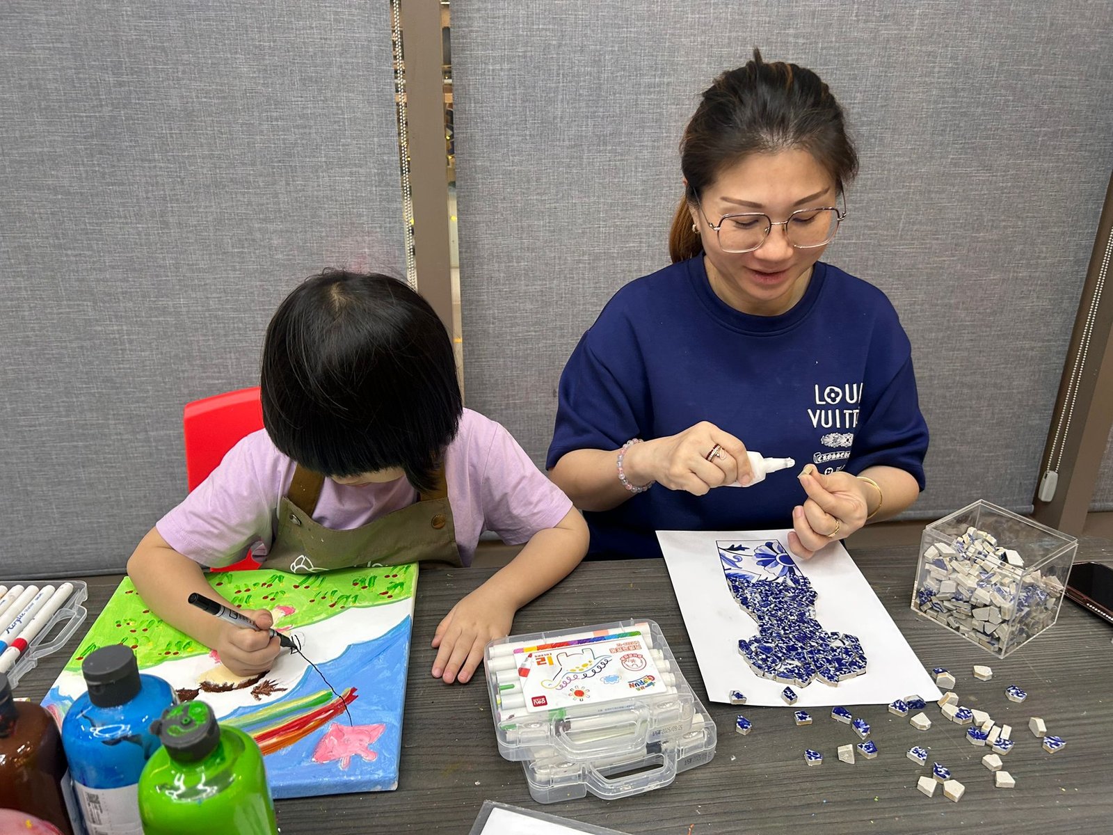 Mother and child enjoying an art jamming session together at Art Journey Singapore