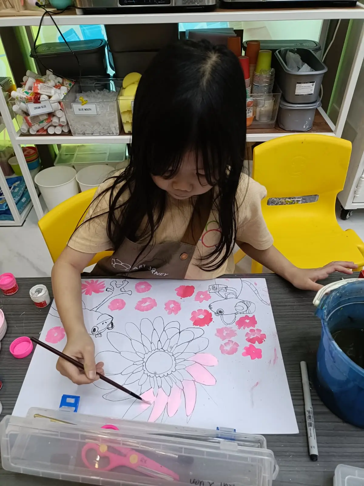 Children happily engaged in a creative art workshop as an alternative to screen time at Art Journey Singapore