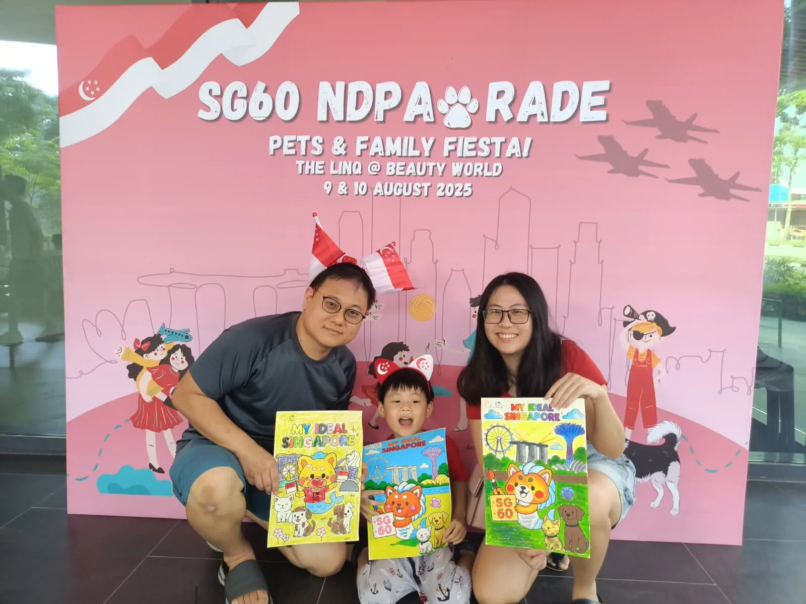 Families celebrating Singapore National Day SG61 with creative activities and festive atmosphere