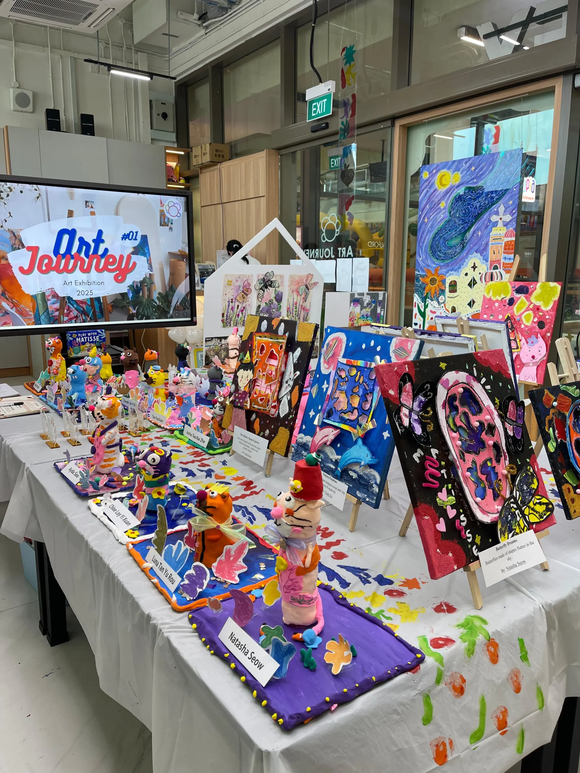 Interior of Art Journey creative studio at Plantation Plaza showing colourful art displays and workshop area