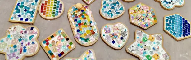 Preschooler arranging mosaic pieces in a pattern