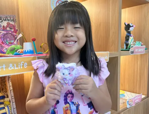 Child building a twist and turn craft