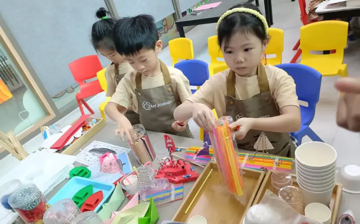 Child painting at Art Journey Singapore — kids art workshop popular with Jurong West families