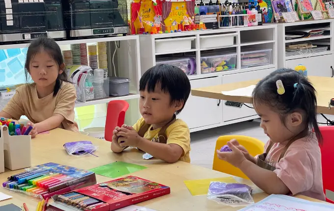 Child working on an after-school art project at Art Journey Singapore Tengah studio