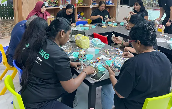 Group of mums enjoying an art jamming session together at Art Journey Singapore