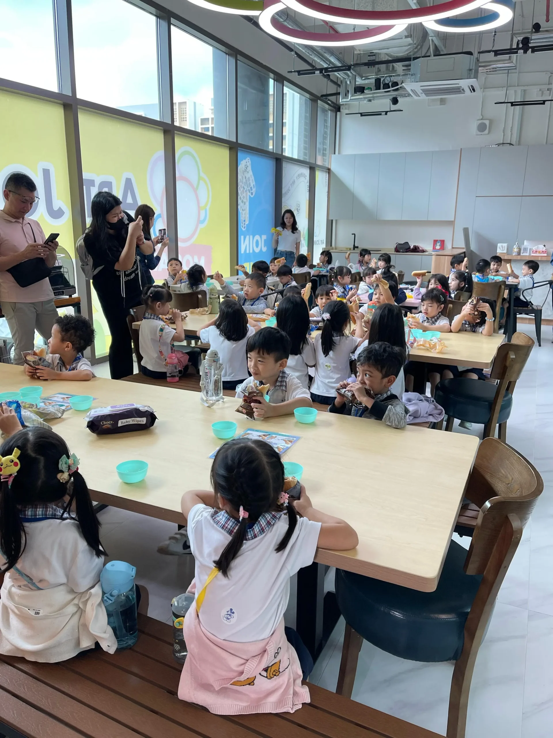 Teenager happily painting at Art Journey Singapore during post-PSLE creative recovery period