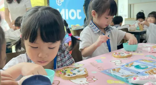 Preschooler hands-on painting and creating at Art Journey Singapore