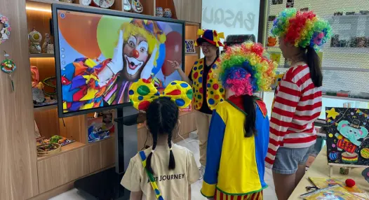 Preschooler in simple role play introducing a session theme at Art Journey Singapore