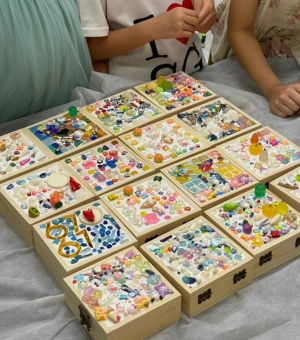 Collection of handmade decorated jewellery boxes from an art jamming party at Art Journey Singapore