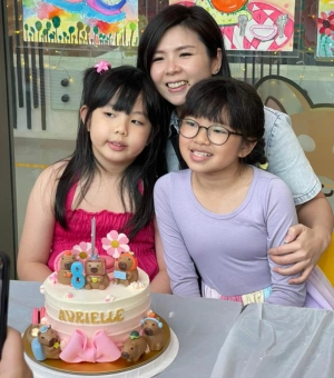 Family celebrating a birthday party at Art Journey creative art studio in Singapore