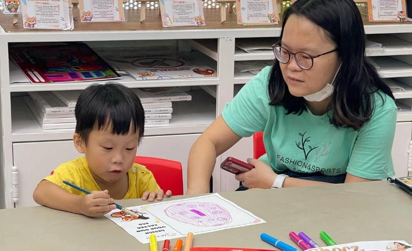 Parent and child having a slow weekday morning coffee and juice together after an art workshop at Art Journey Singapore