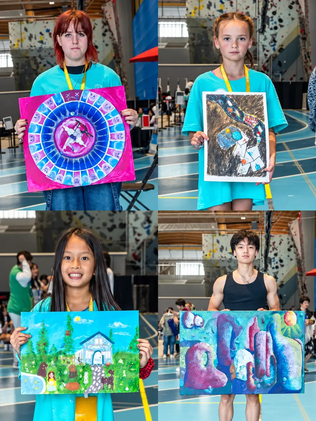 Winners and organisers on stage at the Youth World Cup Painting Competition award ceremony