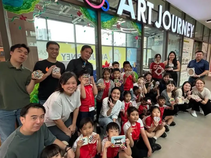 Students engaged in hands-on art activities during school program